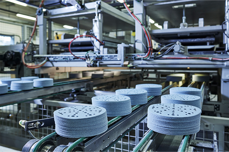 Abrasives on the conveyor