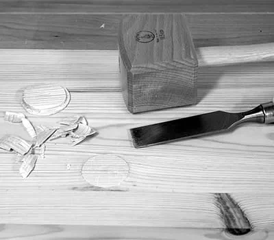 Removing protruding section using firmer chisel