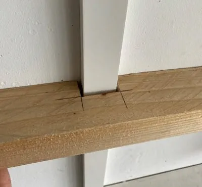 When this work is complete, you can attach the notched frame leg  