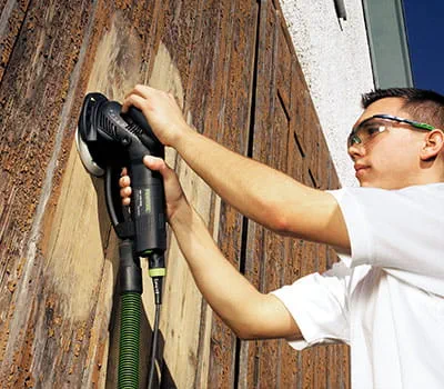 Sanding wooden walls