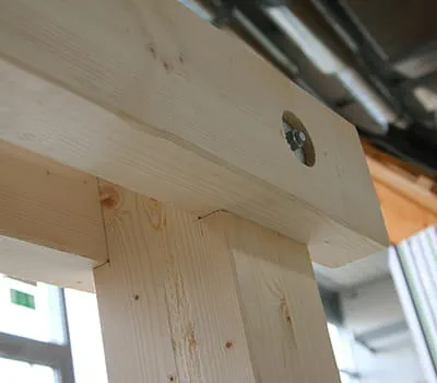 Fit the prepared beams with the appropriate bore holes