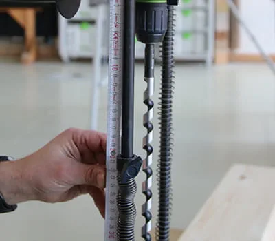 Setting the drilling depth