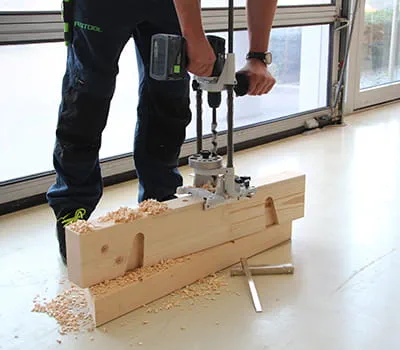 In addition, drill bore holes into the beams