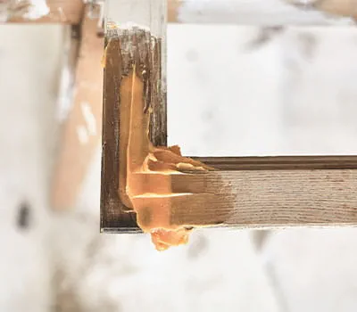 Smoothing out the wood repair compound