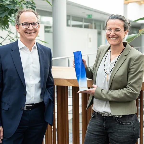 Barbara Austel and Sascha Menges with the "Brands of the Century" trophy