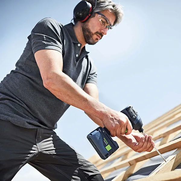 The Festool TID 18 cordless impact screwdriver in operation on the construction site