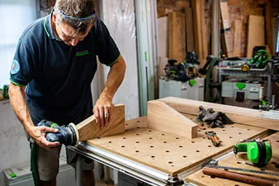 John Argyle in his woodworking workshop