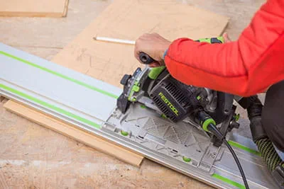Pieces of wood are cut using the Festool portable circular saw