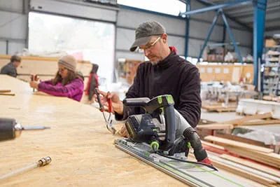 The Festool portable circular saw in operation